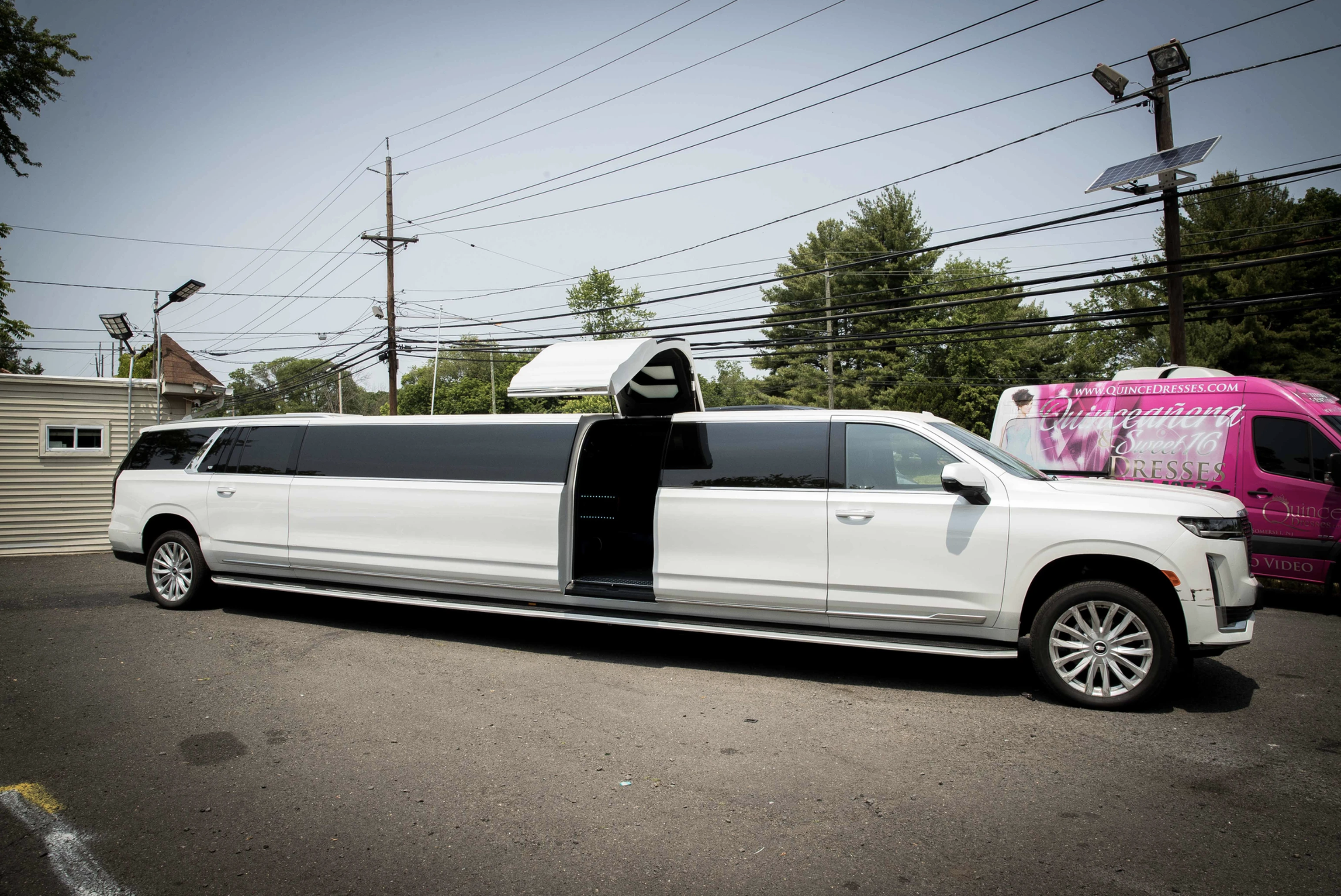 Escalade Stretch Limo With Open Door