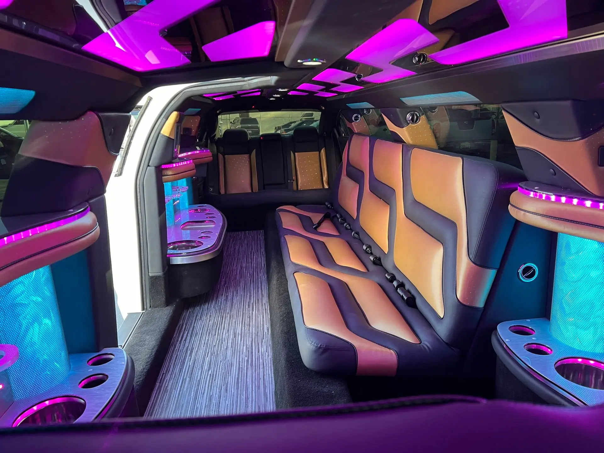 LED-lit interior of Dodge Charger Stretch Limousine with custom leather seating and built-in bar – Basking Ridge Limousine Services