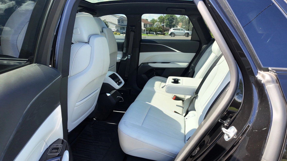 White leather rear passenger seats inside 2025 Cadillac LYRIQ EV