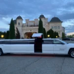 White 2024 Jeep Grand Cherokee stretch limousine parked outside a luxury venue in New Jersey