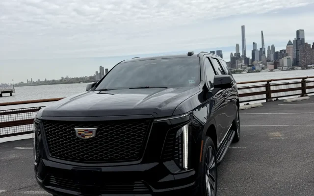 2025 Cadillac Escalade Platinum SUV three-quarter front angle showcasing bold grille and LED lights — luxury chauffeur fleet NJ