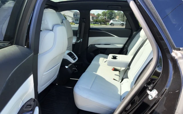 White leather rear passenger seats inside 2025 Cadillac LYRIQ EV