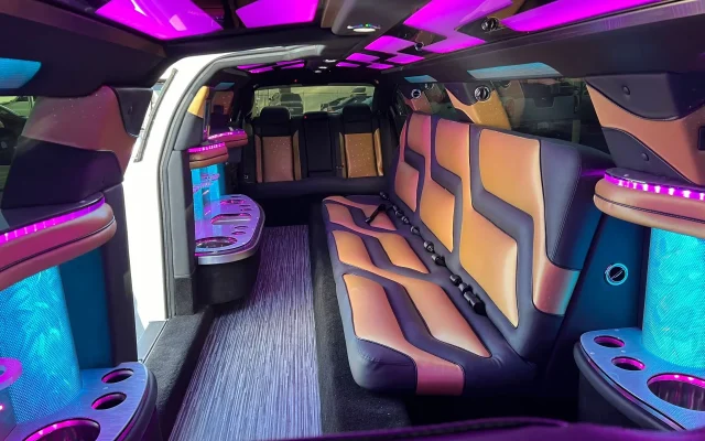 LED-lit interior of Dodge Charger Stretch Limousine with custom leather seating and built-in bar – Basking Ridge Limousine Services