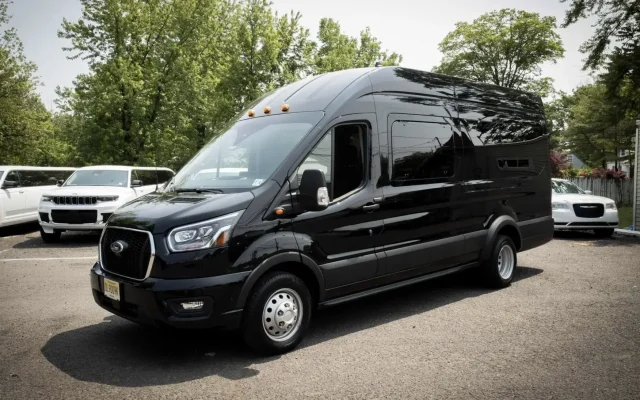 Black Ford Transit luxury van 3/4 front view – Basking Ridge Limousine Services NJ
