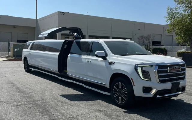Basking Ridge Limousine’s 2025 GMC Yukon Stretch Limousine with gullwing door open.
