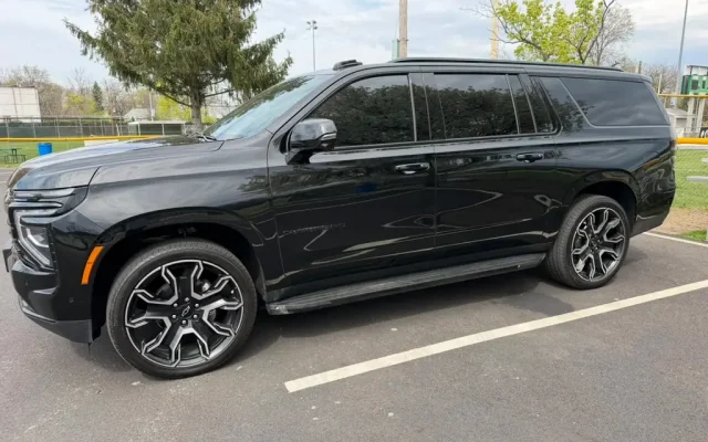 Black Chevrolet 2026 Suburban SUV side profile – luxury car service Basking Ridge NJ