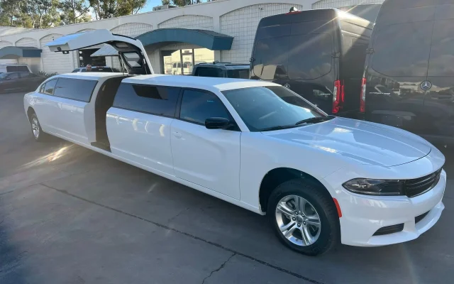 White Dodge Charger Stretch Limousine with gullwing door open – Basking Ridge Limousine Services