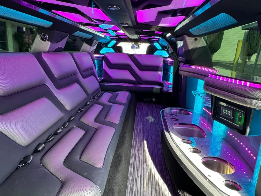 Chrysler 300 stretch limousine interior with purple and blue LED lighting