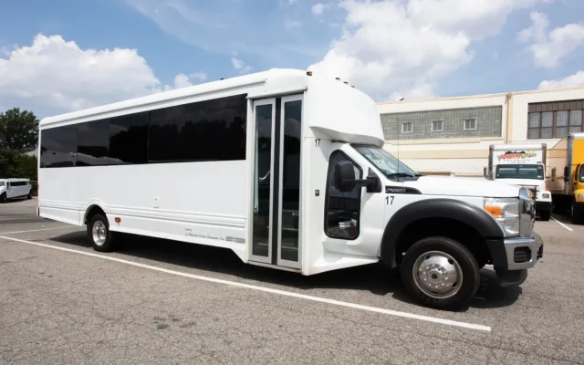 White 25-passenger party bus exterior